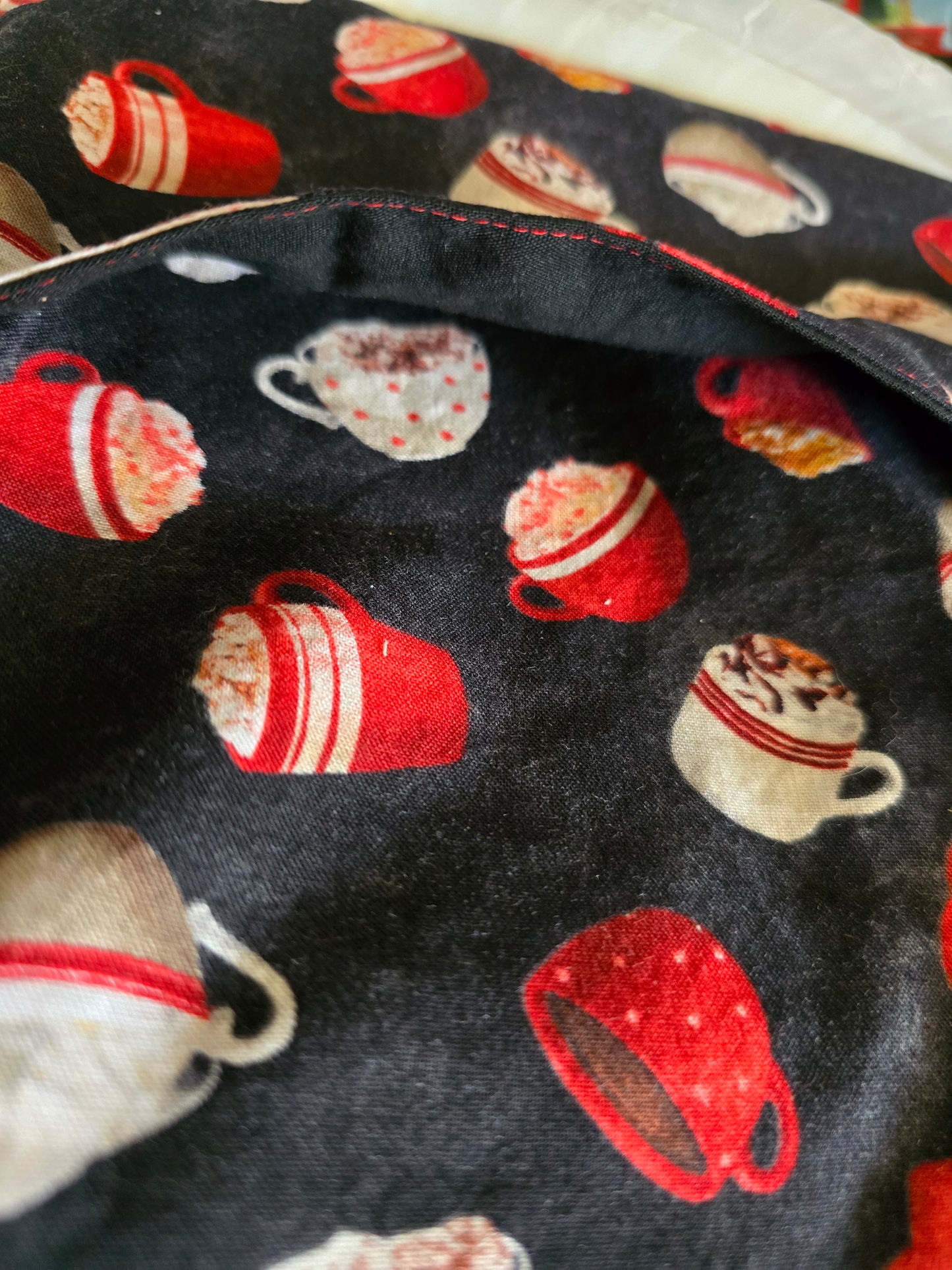 Hot cocoa mugs on black background